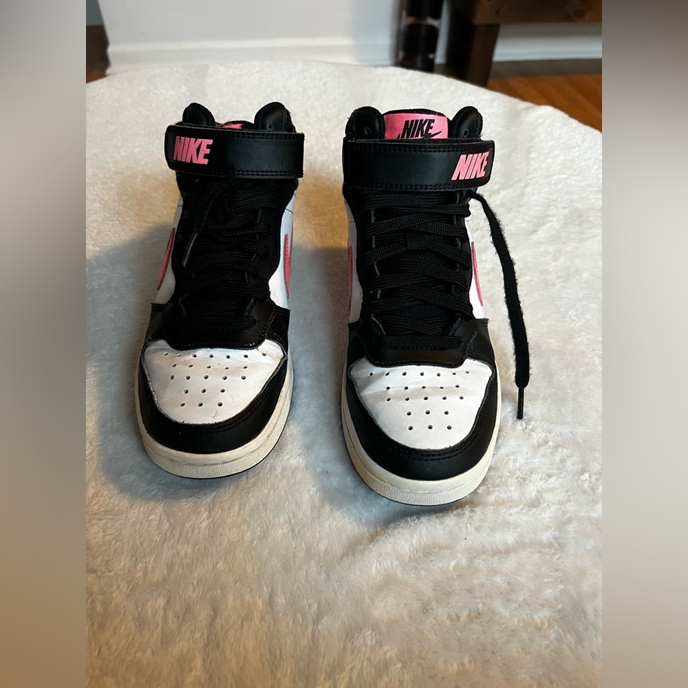S15.    Nike Kids Black and White Sneakers with Pink Accents